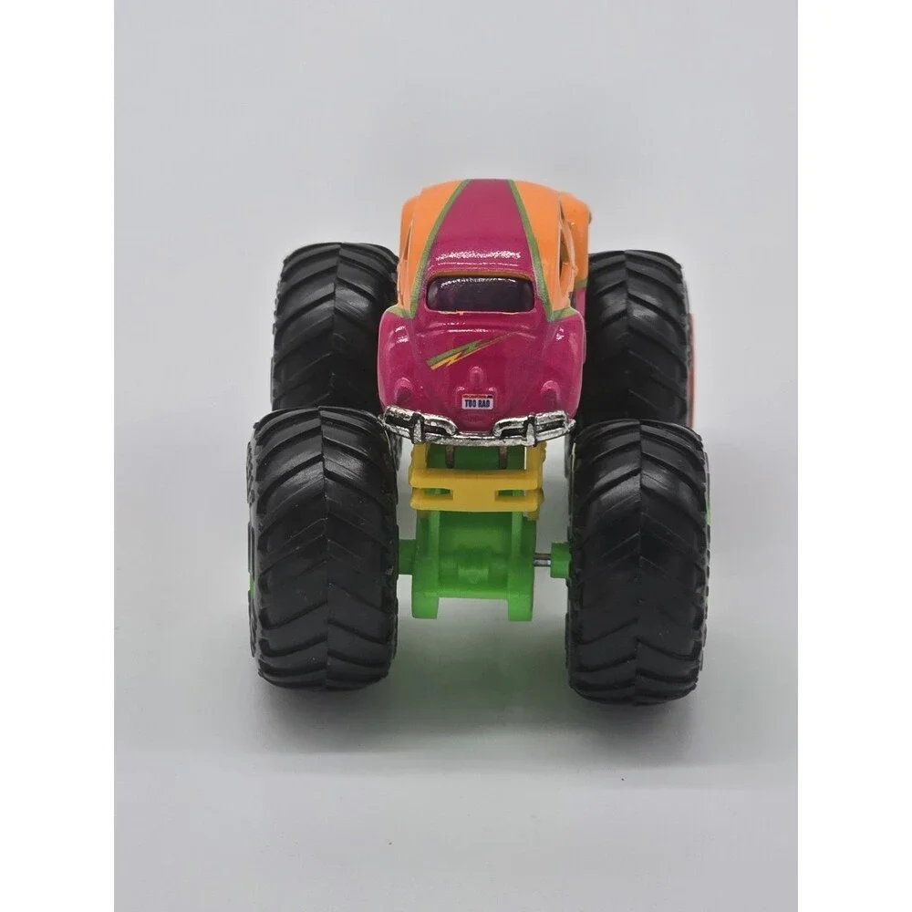 Hot Wheels Monster Trucks VW Beetle Bug Orange w Pink Tampos 1:64 - Mint